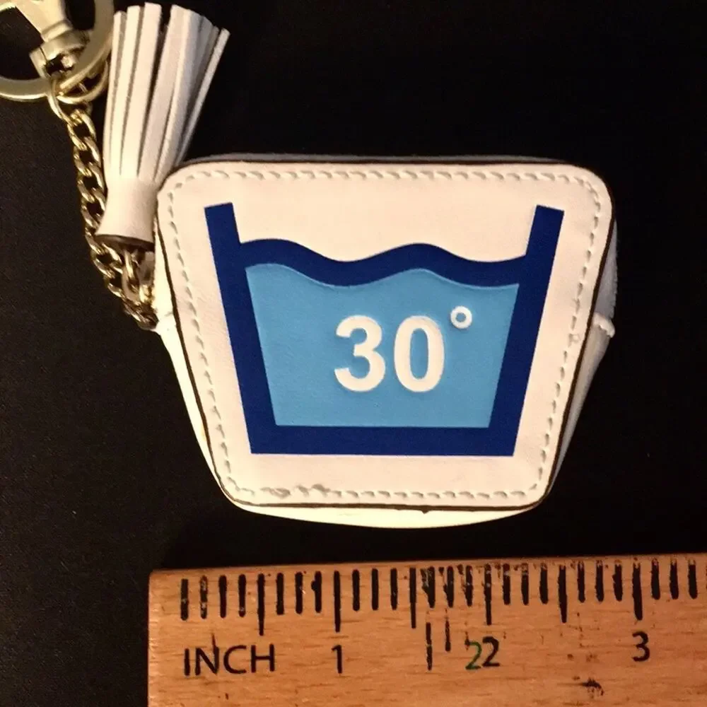 Clothes care symbol keychain NWOT 30• water tassel